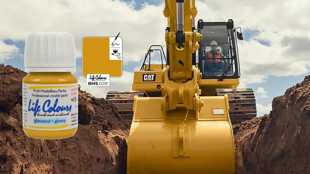 Life Colours Modellbaufarbe im Caterpillar-Gelb vor einem gelben CAT-Bagger
